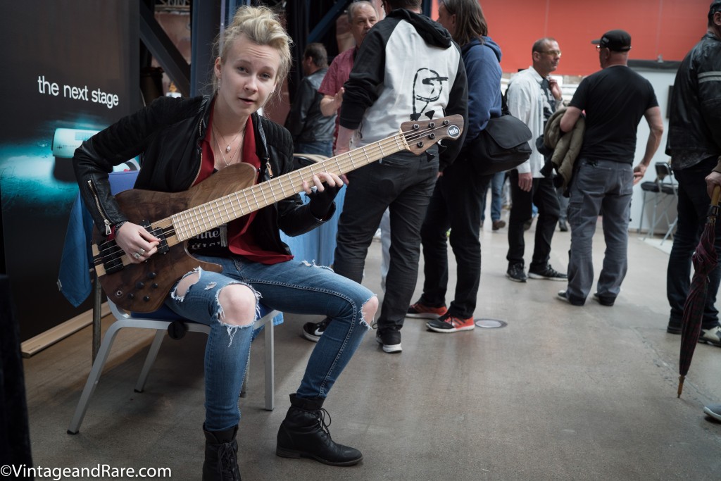 Unknown girl on bass. 