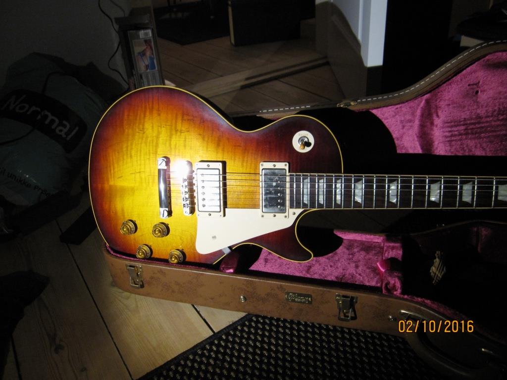 https://www.vintageandrare.com/uploads/offers/1244/11467/gibson-1959-Les-Paul-Collectors-Choice-CC6-Number-One-2013-original.jpg?1707210714