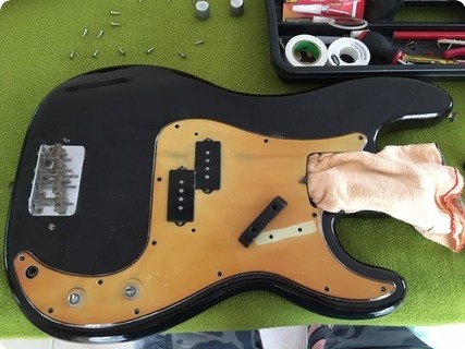 Fender Precision 1957 Refinished Black. Good Condition