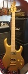 Ernie Ball Music Man Silhouette Gold Roller 2015 GOLD